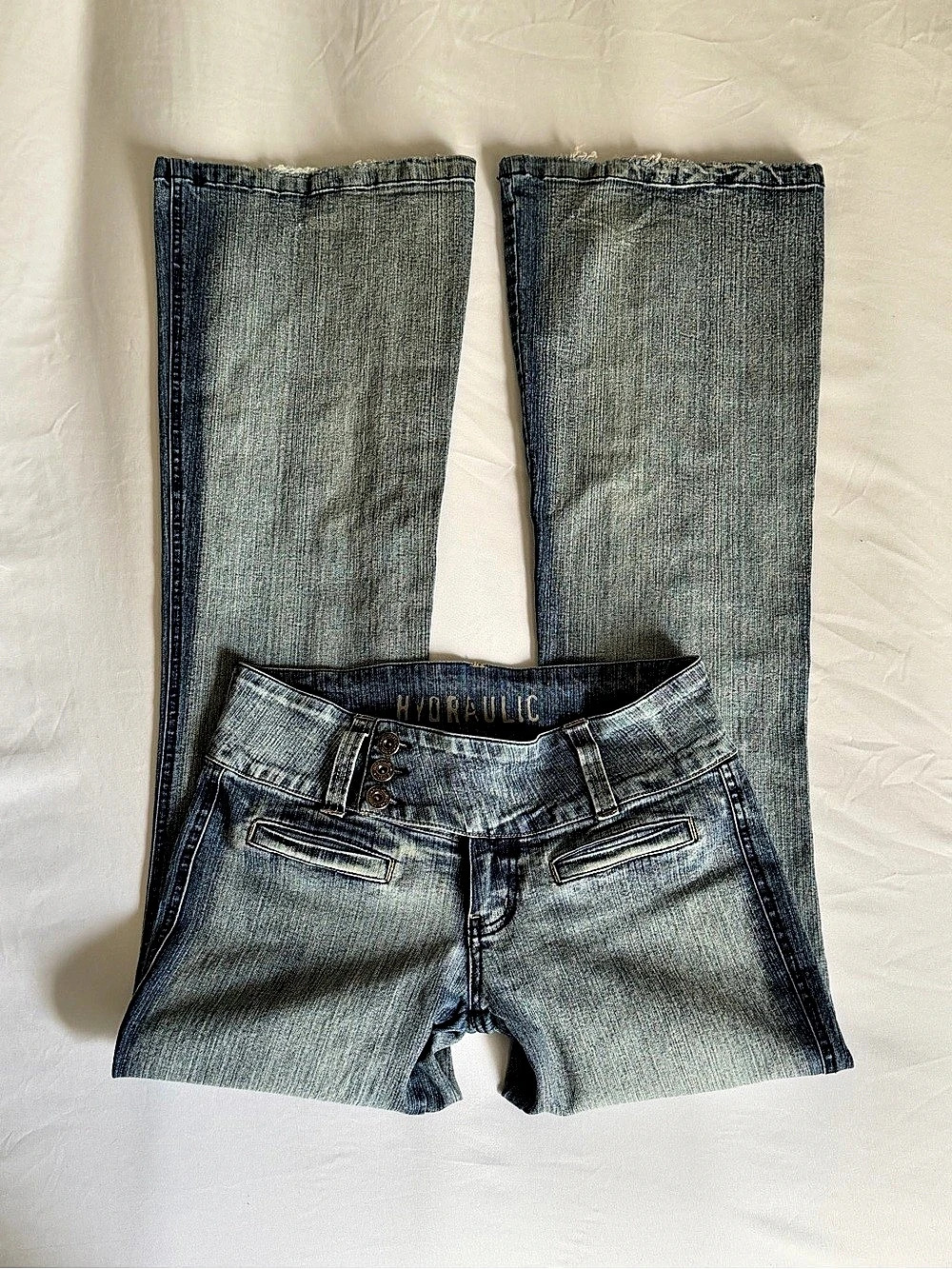 2000s hydraulic triple button jeans